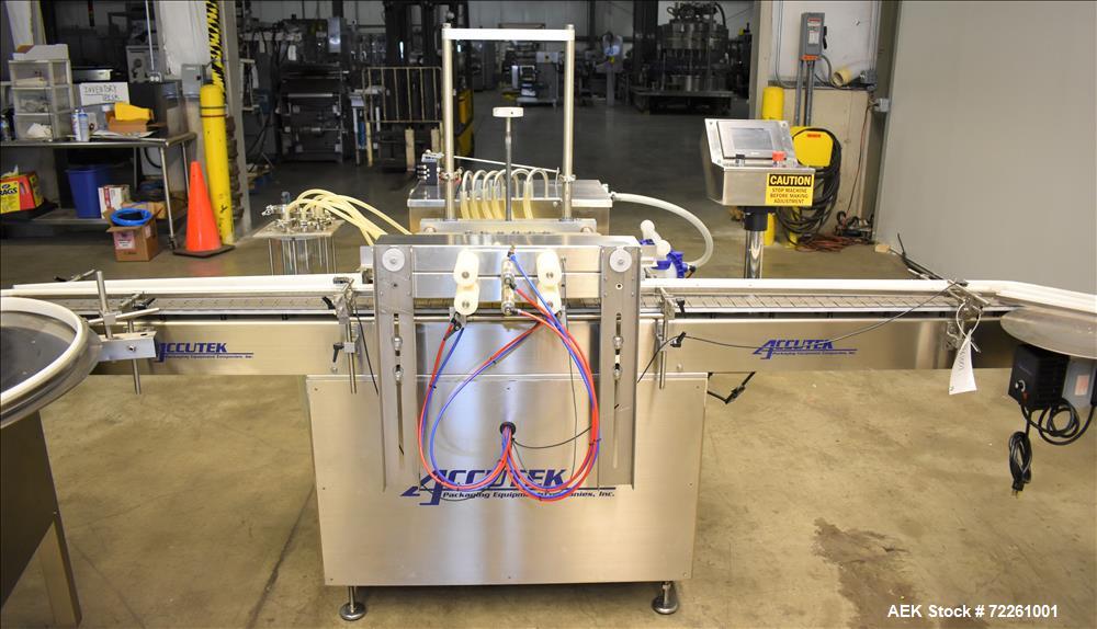 Used Accutek 6 Automatic Vacuum Liquid Filling Line for Glass Containers.