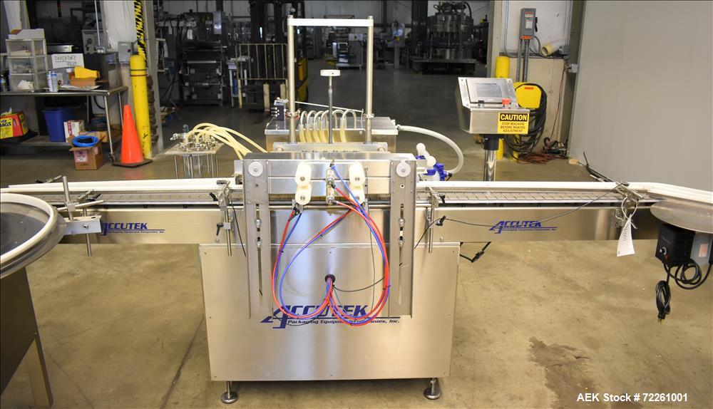 Used- Accutek 6 Automatic Vacuum Liquid Filling Line for Glass Containers.