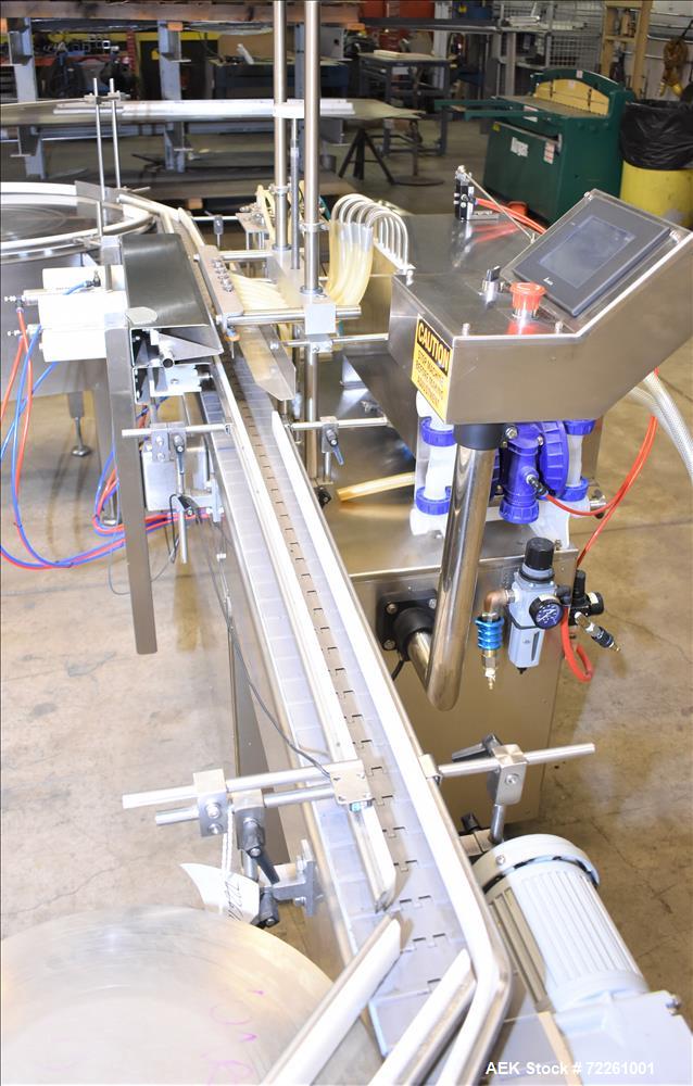 Used- Accutek 6 Automatic Vacuum Liquid Filling Line for Glass Containers.