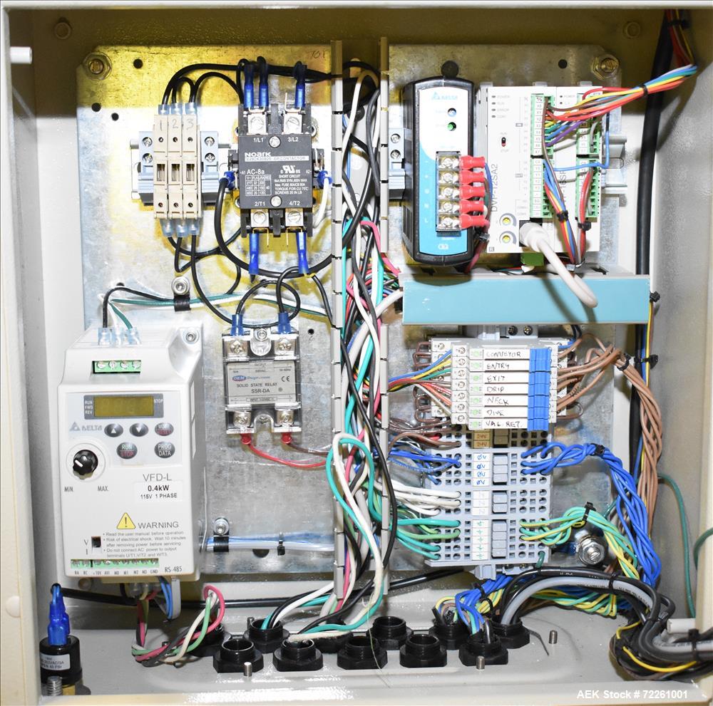 Used Accutek 6 Automatic Vacuum Liquid Filling Line for Glass Containers.