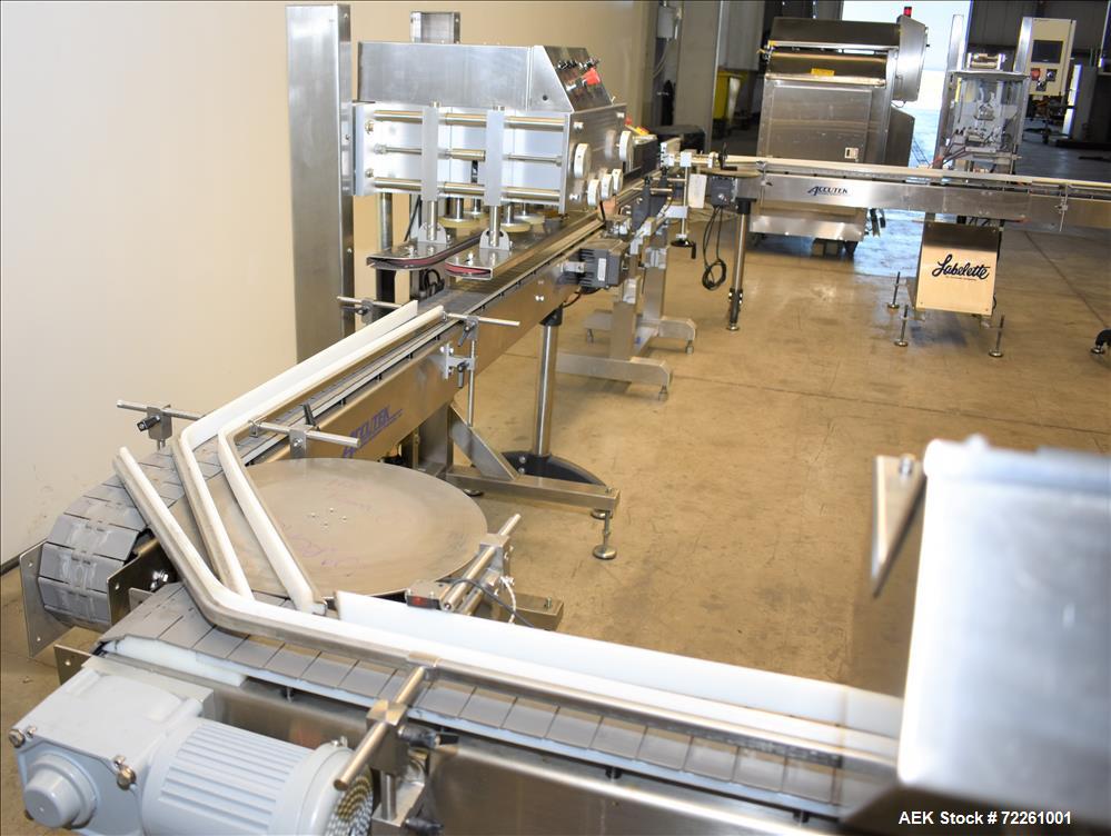 Used Accutek 6 Automatic Vacuum Liquid Filling Line for Glass Containers.