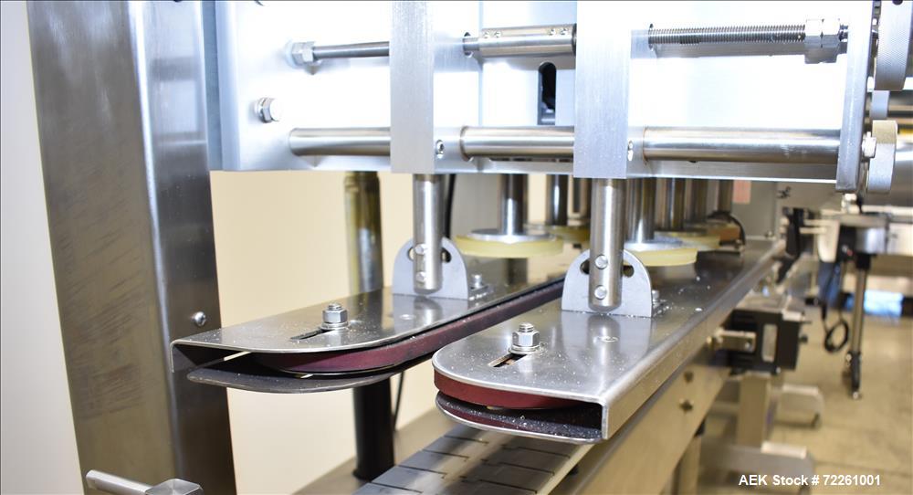 Used Accutek 6 Automatic Vacuum Liquid Filling Line for Glass Containers.