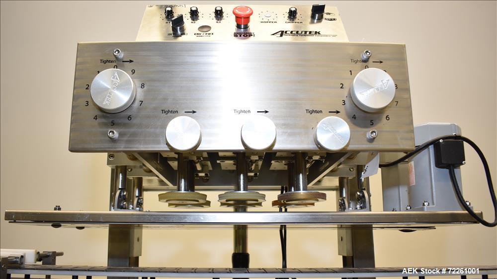 Used Accutek 6 Automatic Vacuum Liquid Filling Line for Glass Containers.