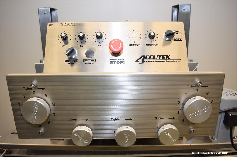 Used Accutek 6 Automatic Vacuum Liquid Filling Line for Glass Containers.