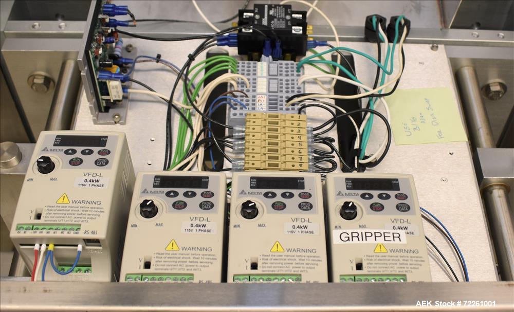 Used Accutek 6 Automatic Vacuum Liquid Filling Line for Glass Containers.