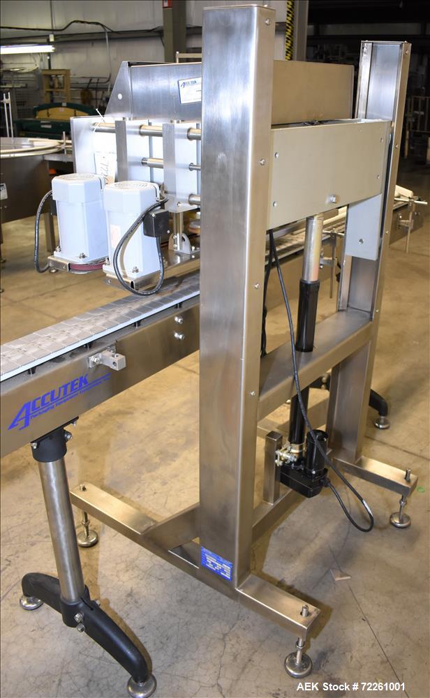 Used Accutek 6 Automatic Vacuum Liquid Filling Line for Glass Containers.