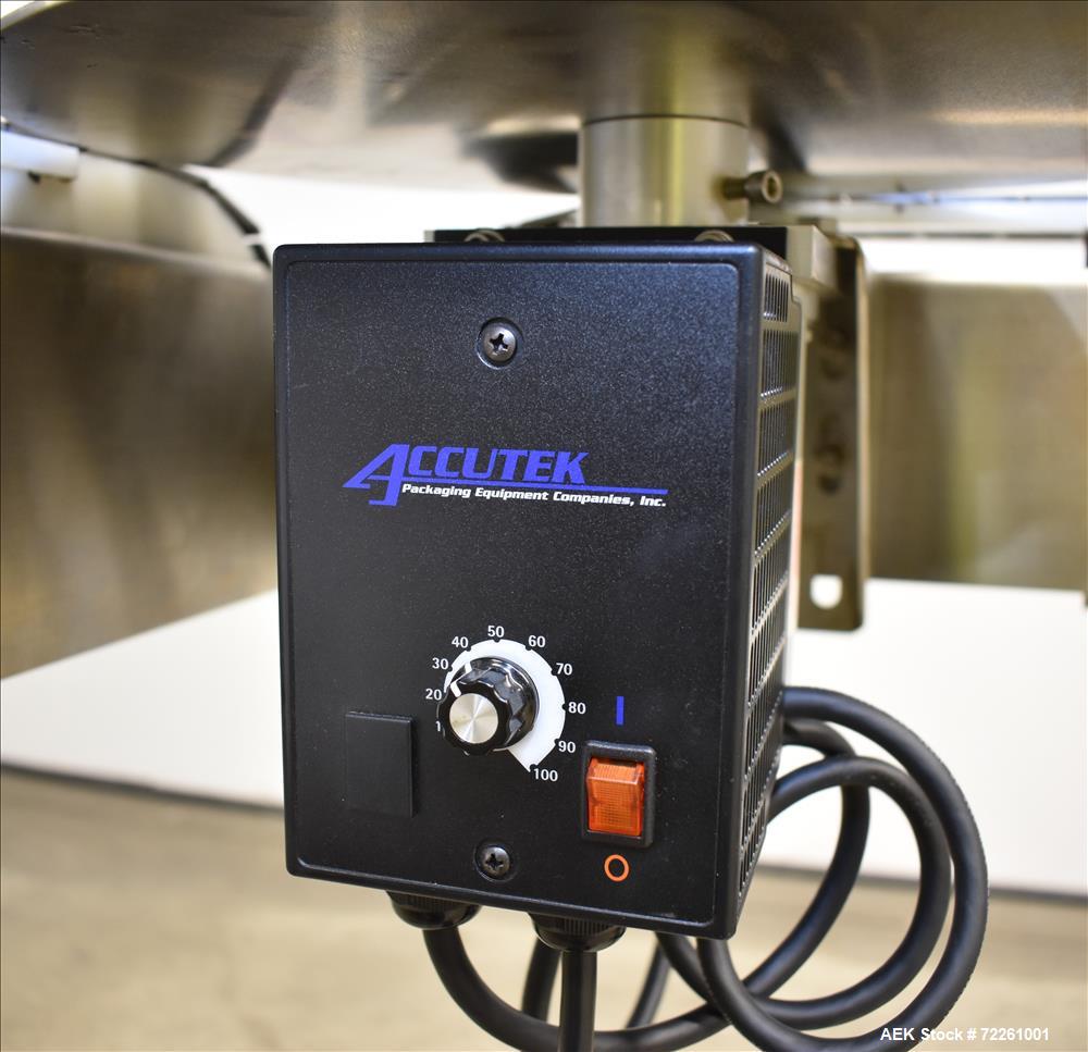 Used Accutek 6 Automatic Vacuum Liquid Filling Line for Glass Containers.
