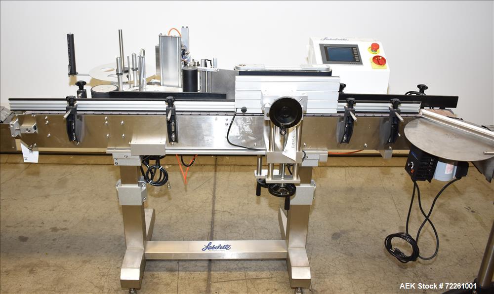 Used Accutek 6 Automatic Vacuum Liquid Filling Line for Glass Containers.