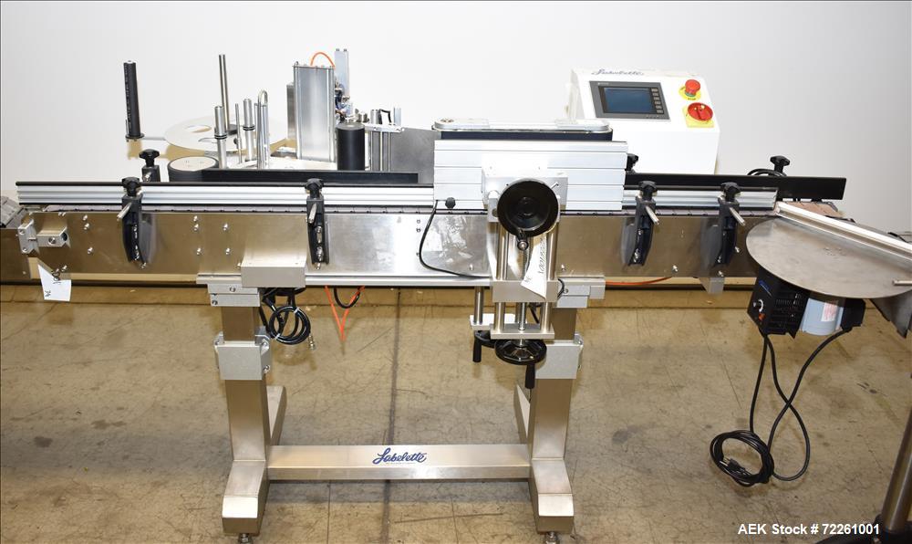 Used- Accutek 6 Automatic Vacuum Liquid Filling Line for Glass Containers.