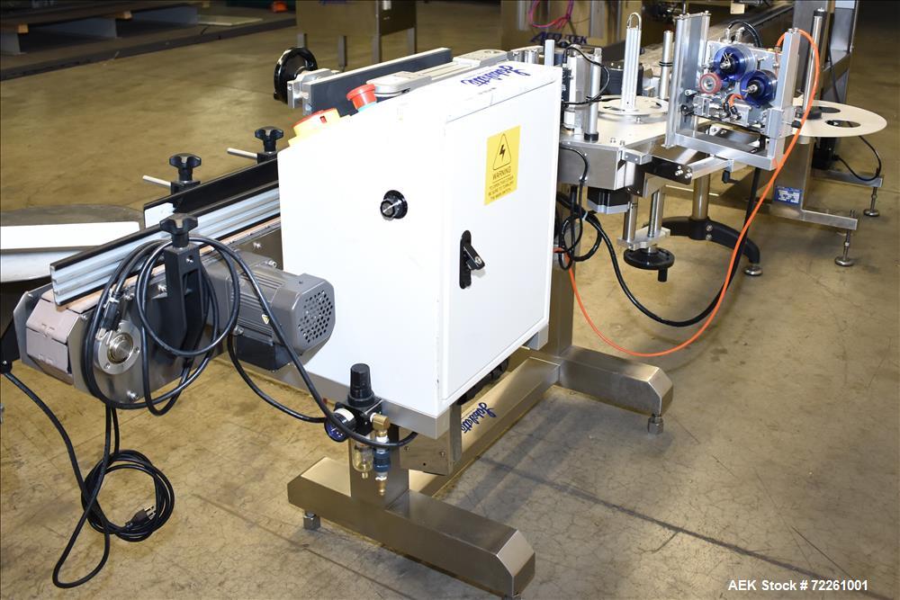 Used Accutek 6 Automatic Vacuum Liquid Filling Line for Glass Containers.