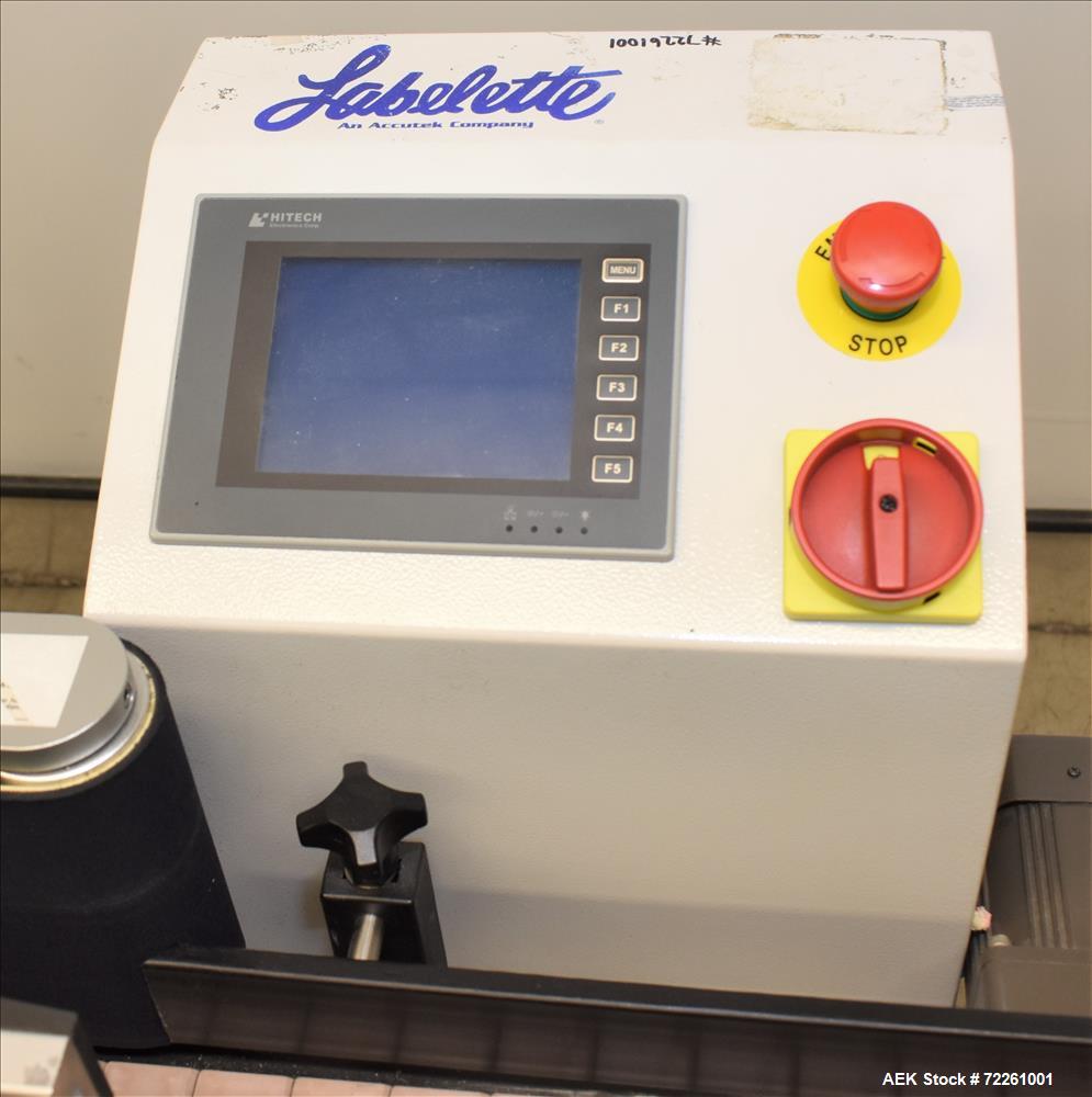 Used Accutek 6 Automatic Vacuum Liquid Filling Line for Glass Containers.