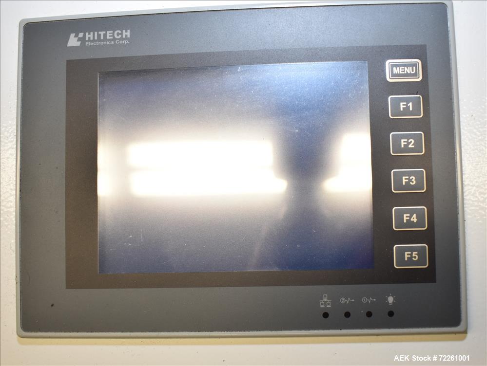 Used Accutek 6 Automatic Vacuum Liquid Filling Line for Glass Containers.
