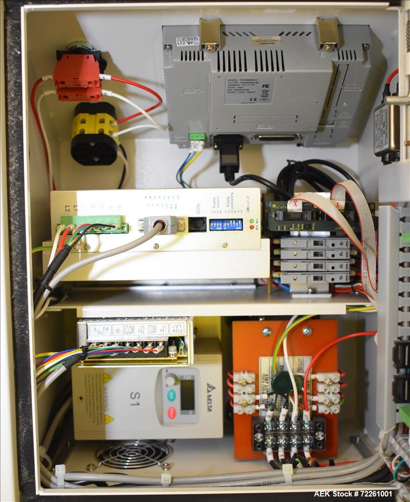Used Accutek 6 Automatic Vacuum Liquid Filling Line for Glass Containers.
