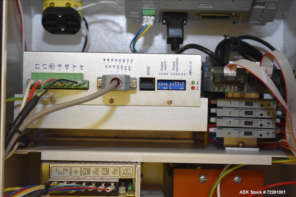 Used Accutek 6 Automatic Vacuum Liquid Filling Line for Glass Containers.