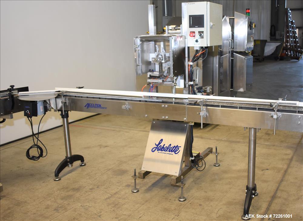 Used Accutek 6 Automatic Vacuum Liquid Filling Line for Glass Containers.