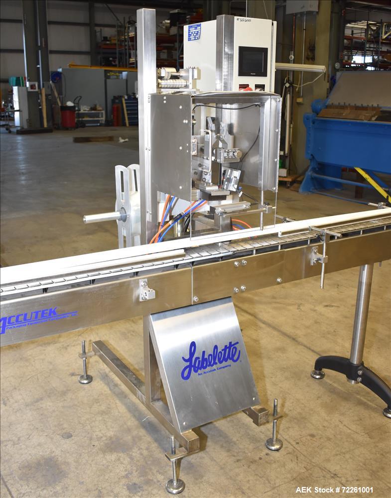 Used Accutek 6 Automatic Vacuum Liquid Filling Line for Glass Containers.