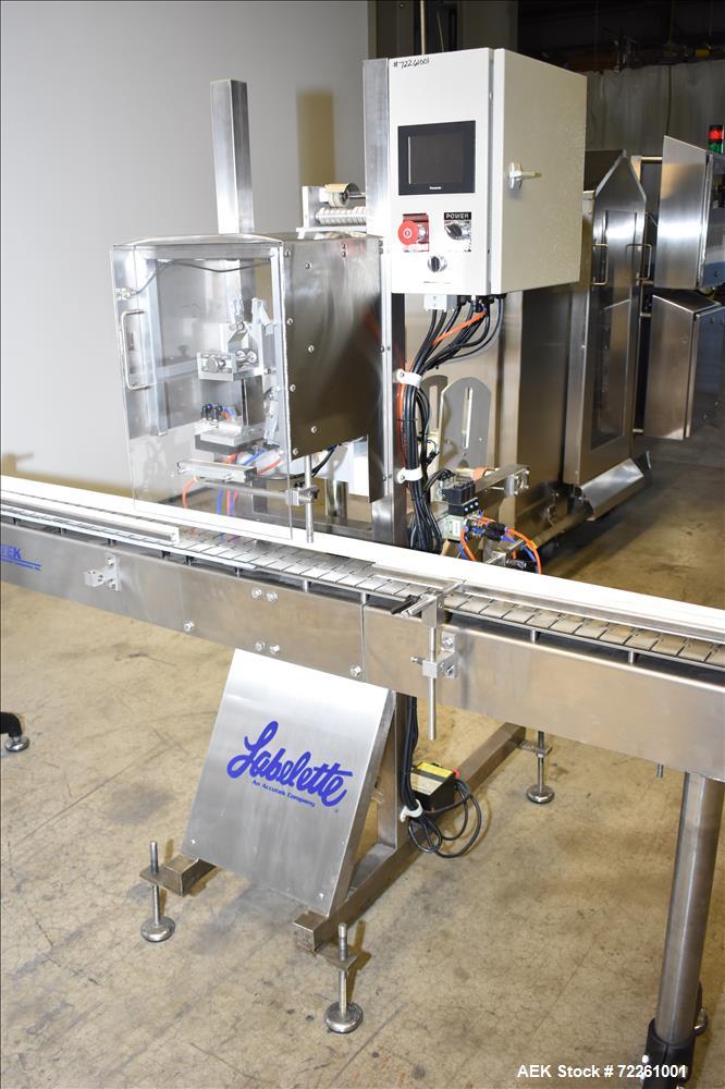 Used Accutek 6 Automatic Vacuum Liquid Filling Line for Glass Containers.