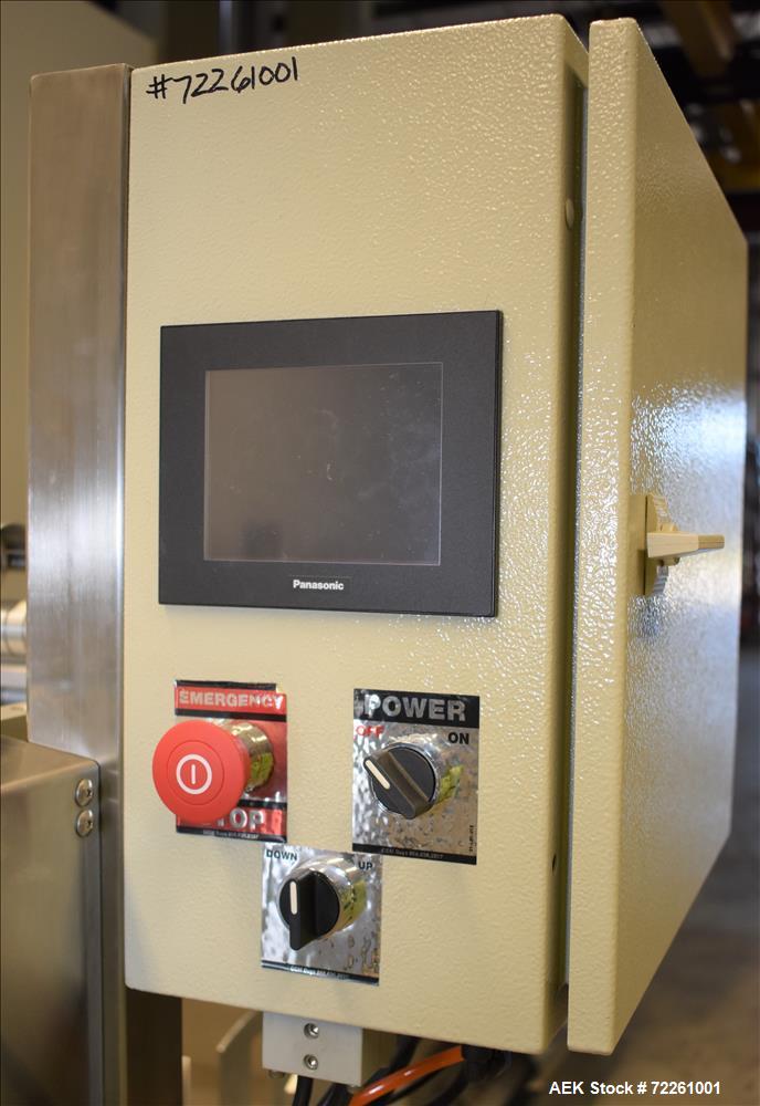 Used Accutek 6 Automatic Vacuum Liquid Filling Line for Glass Containers.