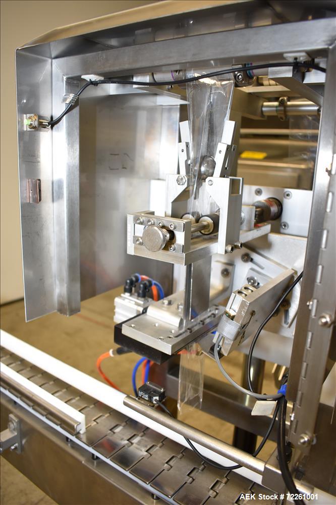 Used Accutek 6 Automatic Vacuum Liquid Filling Line for Glass Containers.