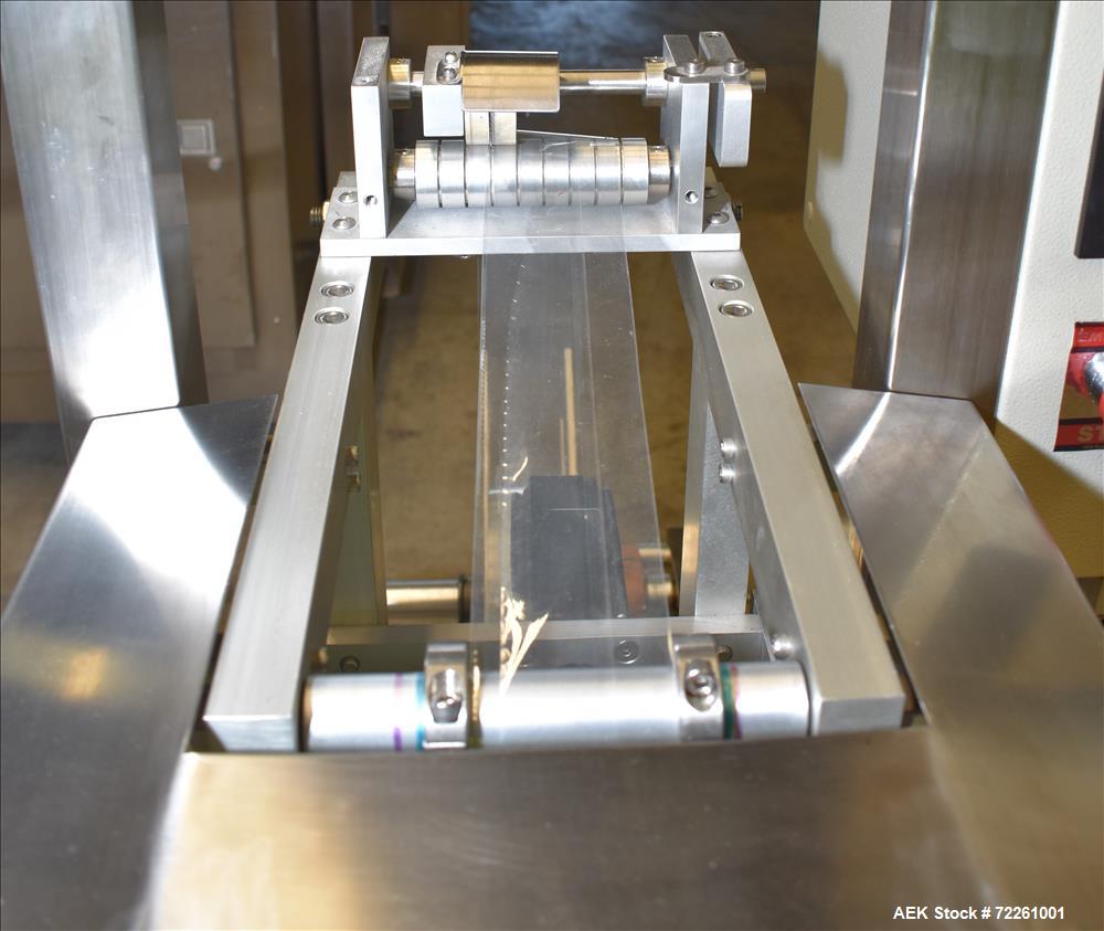 Used Accutek 6 Automatic Vacuum Liquid Filling Line for Glass Containers.