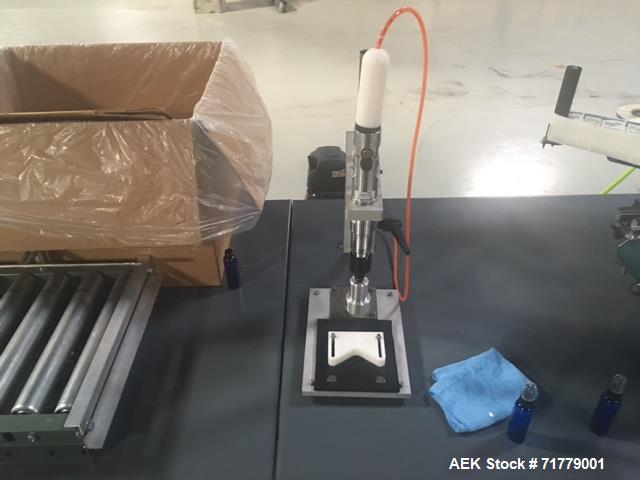 Used Accutek Table Top Filling System, semi-auto operation, consisting of; Mini-Pinch (Six Head) Timed Flow Volumetric Filler, with Adjustable Table Top Stand, Fill Wand, Individual Flow Control Adju...