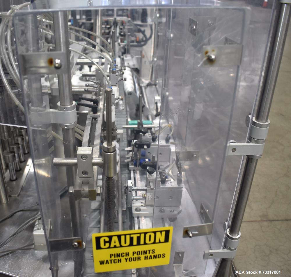 Used Capmatic Intrepid Model 4A/X-PP-222 Monoblock Filler, Plugger & Capper – 60 CPM Capacity