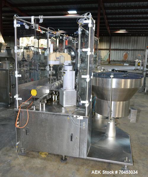 Used Capmatic Straight Line Automatic “Puck Style” Fragrance Line, Model Patriot L, S/N PA03101111, new 2004.  3/60/480V/20A.  6 Head Straight Line Vacuum Filler, Model Vacufill, S/N RV03101110, with...