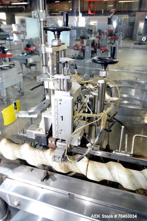 Used Capmatic Straight Line Automatic “Puck Style” Fragrance Line, Model Patriot L, S/N PA03101111, new 2004.  3/60/480V/20A.  6 Head Straight Line Vacuum Filler, Model Vacufill, S/N RV03101110, with...