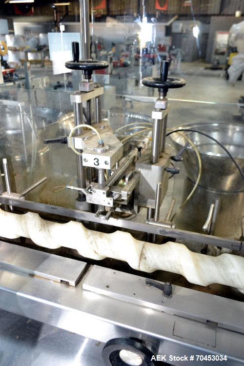 Used Capmatic Straight Line Automatic “Puck Style” Fragrance Line, Model Patriot L, S/N PA03101111, new 2004.  3/60/480V/20A.  6 Head Straight Line Vacuum Filler, Model Vacufill, S/N RV03101110, with...
