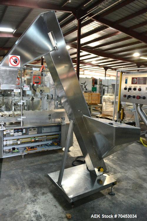 Used Capmatic Straight Line Automatic “Puck Style” Fragrance Line, Model Patriot L, S/N PA03101111, new 2004.  3/60/480V/20A.  6 Head Straight Line Vacuum Filler, Model Vacufill, S/N RV03101110, with...