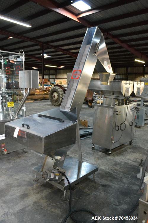 Used Capmatic Straight Line Automatic “Puck Style” Fragrance Line, Model Patriot L, S/N PA03101111, new 2004.  3/60/480V/20A.  6 Head Straight Line Vacuum Filler, Model Vacufill, S/N RV03101110, with...