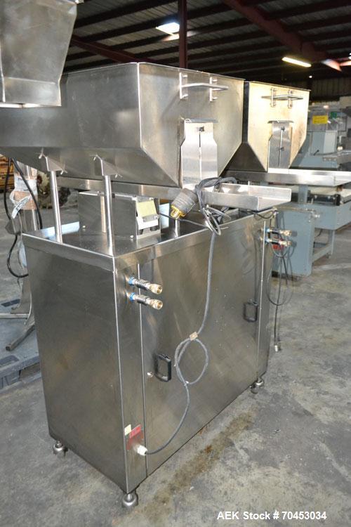 Used Capmatic Straight Line Automatic “Puck Style” Fragrance Line, Model Patriot L, S/N PA03101111, new 2004.  3/60/480V/20A.  6 Head Straight Line Vacuum Filler, Model Vacufill, S/N RV03101110, with...
