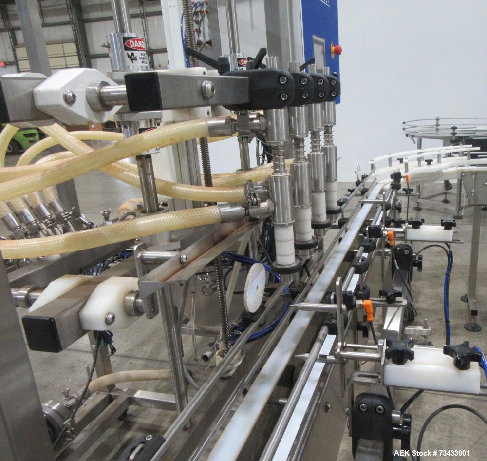 Complete Inline Bottle Filling and Packaging Line – Overflow Filler, Capper & Labeler