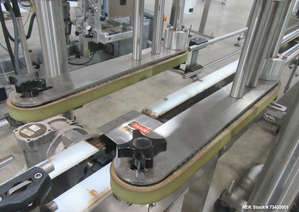 Complete Inline Bottle Filling and Packaging Line – Overflow Filler, Capper & Labeler