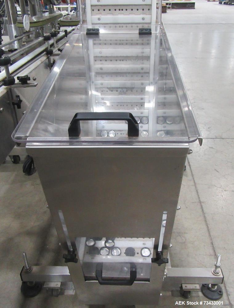 Complete Inline Bottle Filling and Packaging Line – Overflow Filler, Capper & Labeler