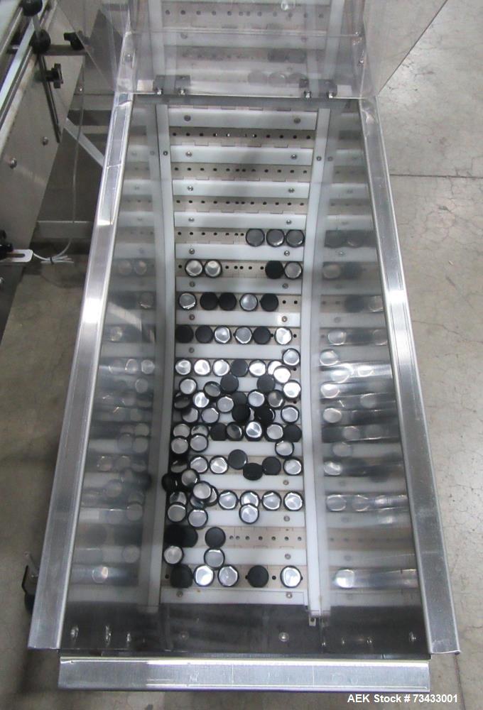 Complete Inline Bottle Filling and Packaging Line – Overflow Filler, Capper & Labeler