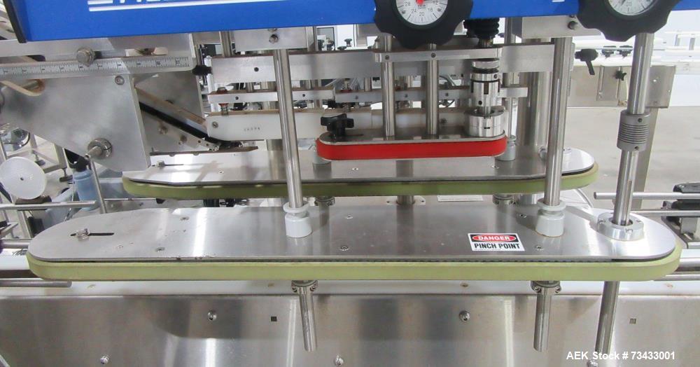 Complete Inline Bottle Filling and Packaging Line – Overflow Filler, Capper & Labeler