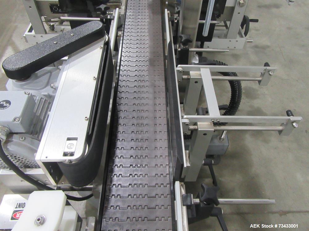 Complete Inline Bottle Filling and Packaging Line – Overflow Filler, Capper & Labeler