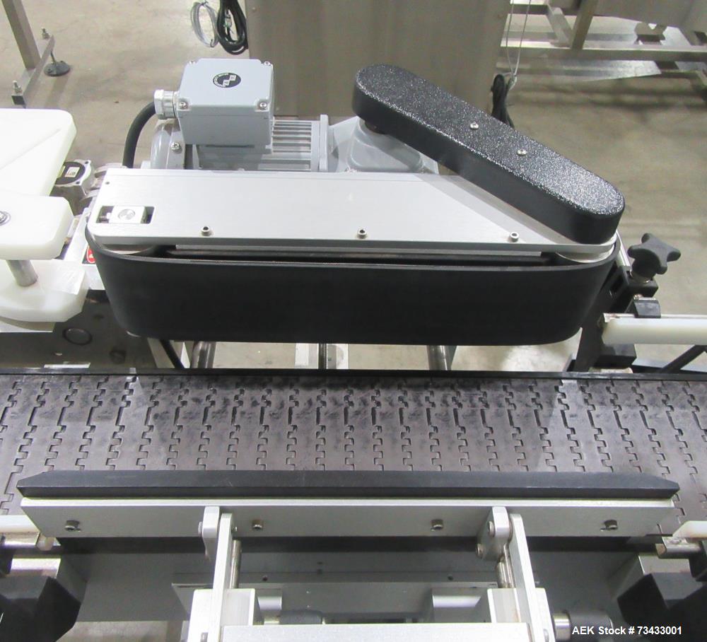 Complete Inline Bottle Filling and Packaging Line – Overflow Filler, Capper & Labeler