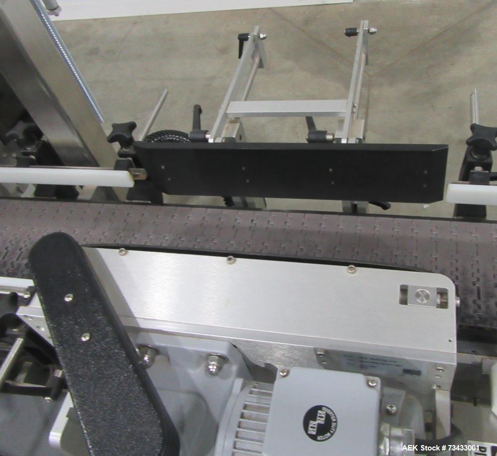 Complete Inline Bottle Filling and Packaging Line – Overflow Filler, Capper & Labeler