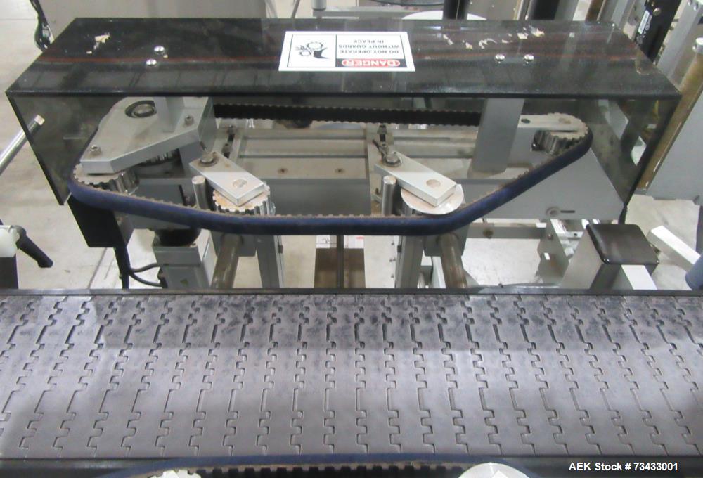Complete Inline Bottle Filling and Packaging Line – Overflow Filler, Capper & Labeler