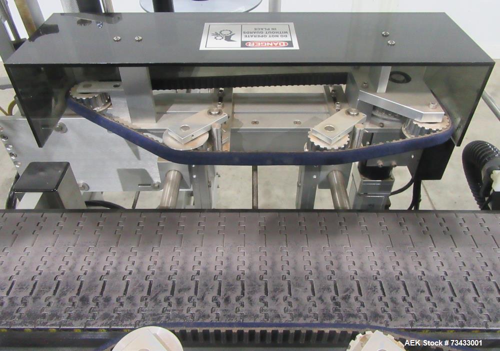 Complete Inline Bottle Filling and Packaging Line – Overflow Filler, Capper & Labeler