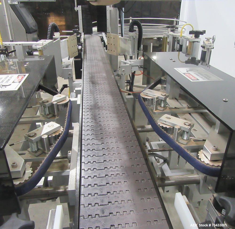 Complete Inline Bottle Filling and Packaging Line – Overflow Filler, Capper & Labeler