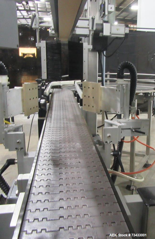 Complete Inline Bottle Filling and Packaging Line – Overflow Filler, Capper & Labeler