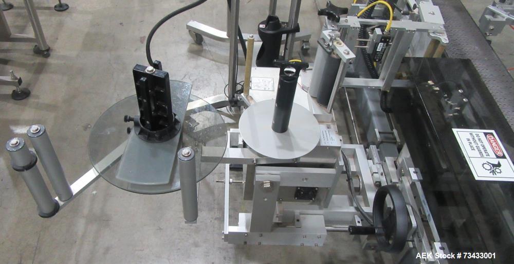 Complete Inline Bottle Filling and Packaging Line – Overflow Filler, Capper & Labeler