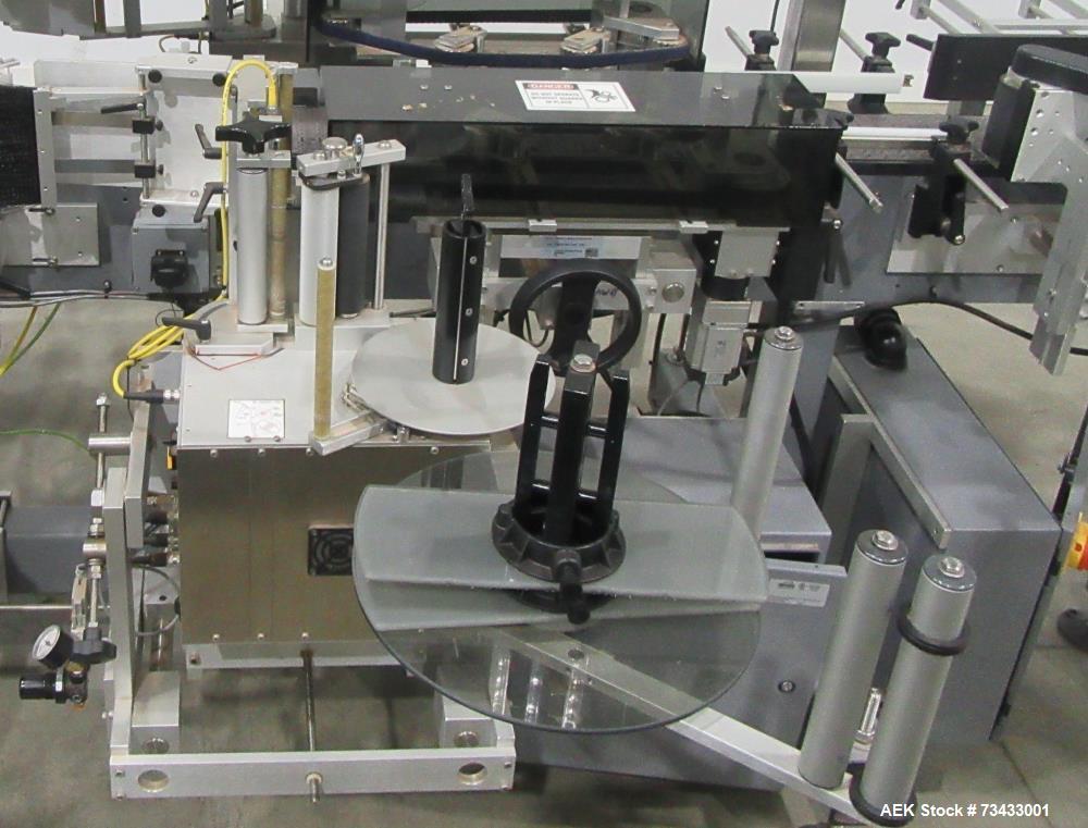 Complete Inline Bottle Filling and Packaging Line – Overflow Filler, Capper & Labeler