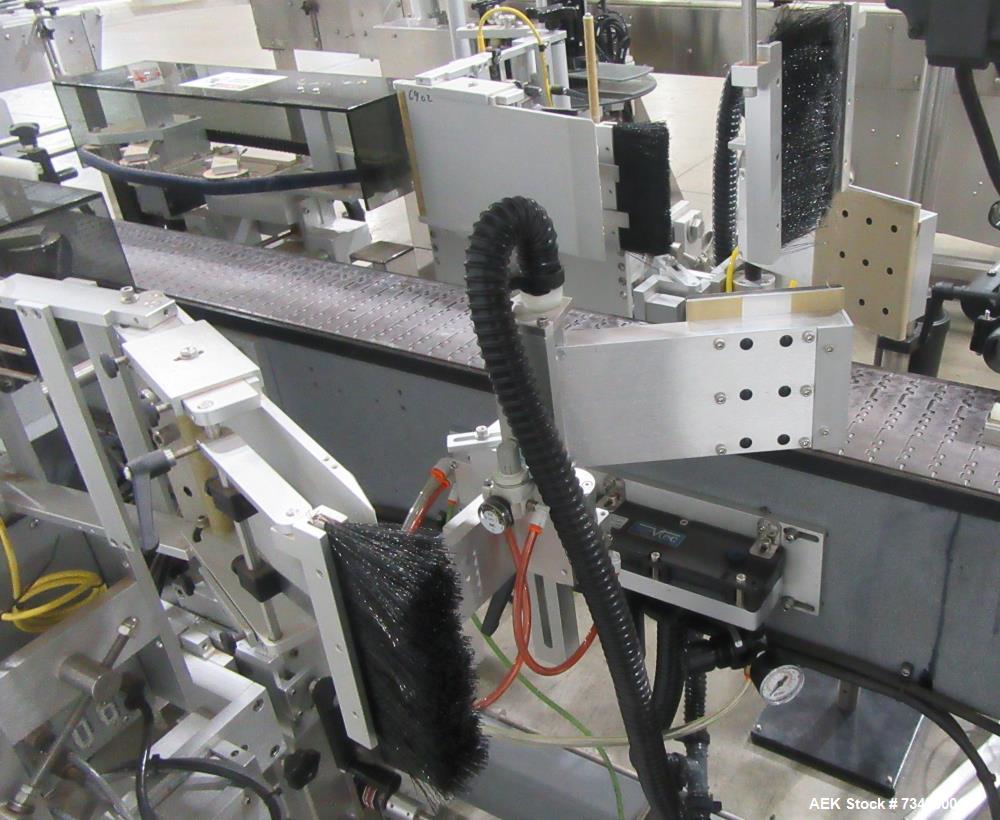 Complete Inline Bottle Filling and Packaging Line – Overflow Filler, Capper & Labeler