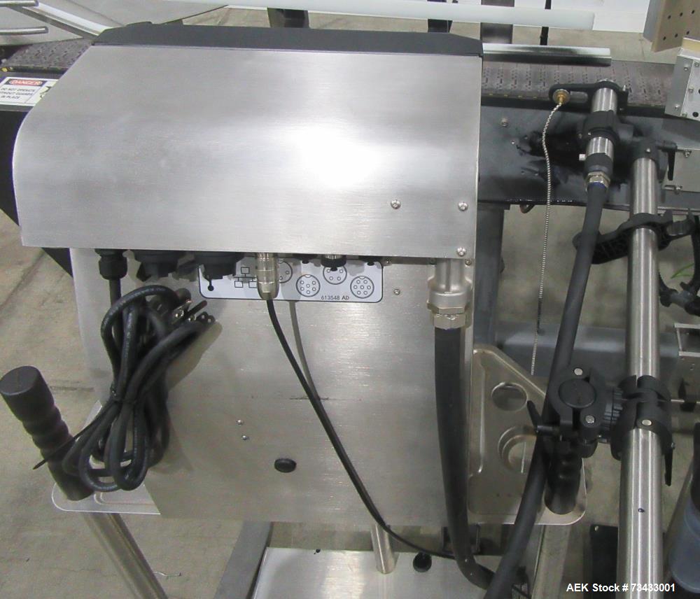 Complete Inline Bottle Filling and Packaging Line – Overflow Filler, Capper & Labeler