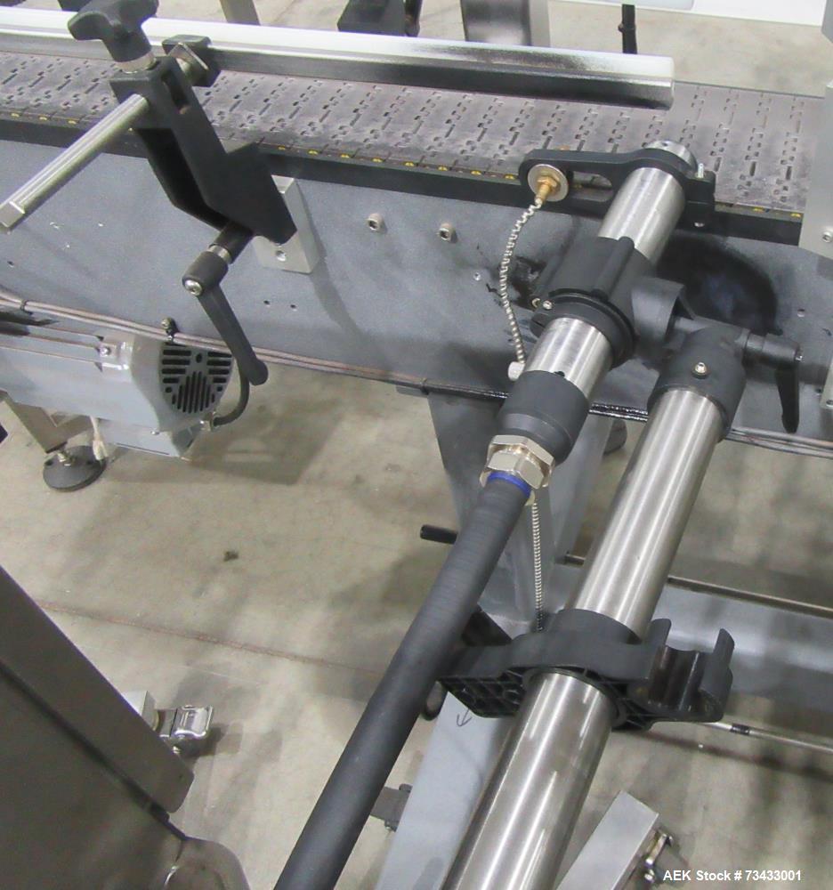 Complete Inline Bottle Filling and Packaging Line – Overflow Filler, Capper & Labeler