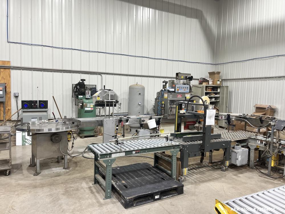 Used Inline Filling Systems Complete Liquid Filling Line. Line Consists of 10 Head Inline Fillers, Kapsall Model A6-R Capper with Integrated Cap Elevator and Centrifugal Cap Sorter, Dual Belt, Kapsal...